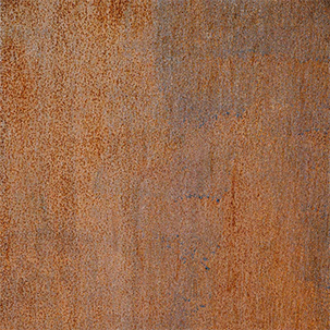Acier Corten avec texture granuleuse et patine naturelle orangée et brune